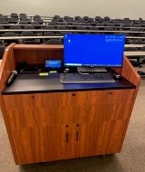 Computer at podium in classroom