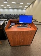 Computer at podium in classroom