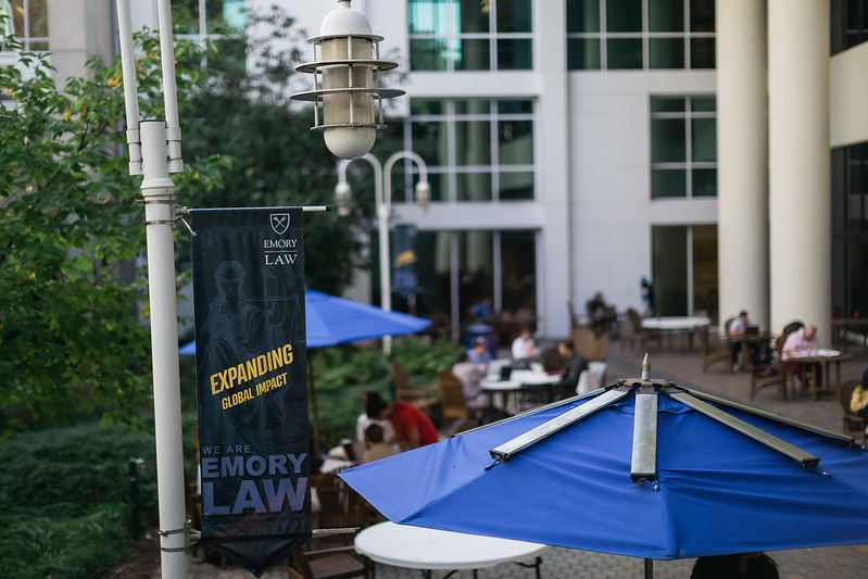 View of Bacardi Plaza with Emory Law banner and students