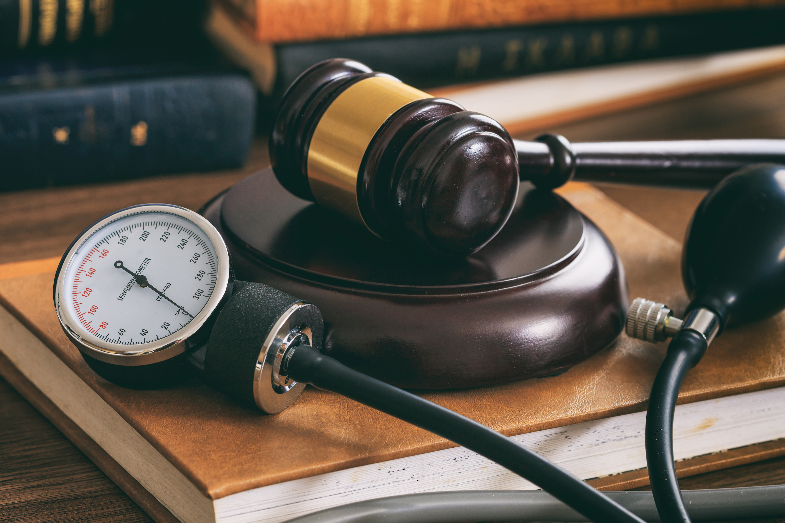 gavel and blood pressure cuff